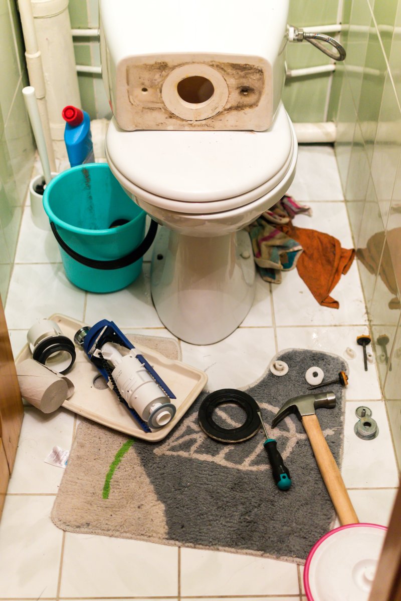 New toilet being installed in a Worcester Park bathroom